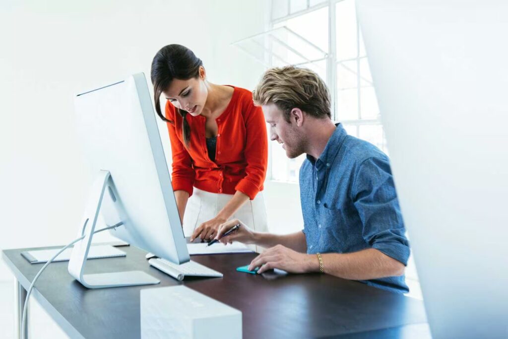 business people working on computer by office wind 2024 10 18 09 29 42 utc