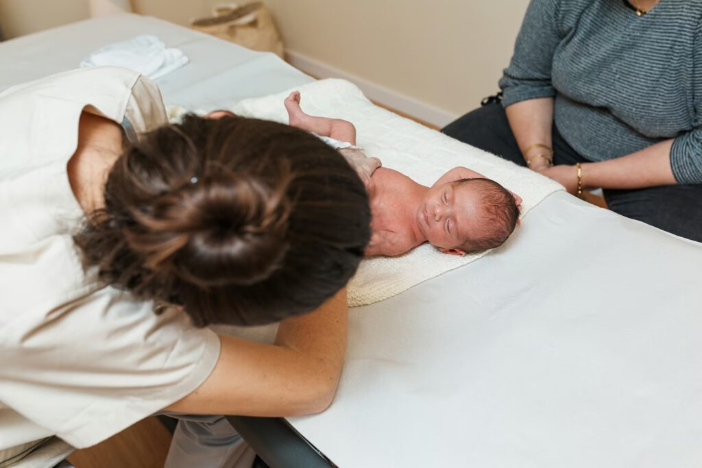 Pre & Postnatal Clinic 4 female physiotherapist working with a newborn baby 2025 01 09 02 14 07 utc